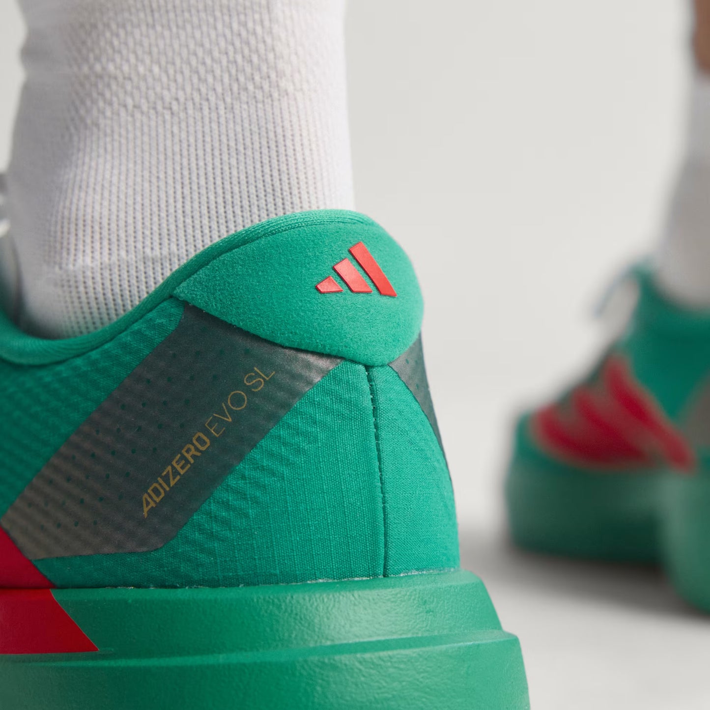 ADIZERO EVO SL WOVEN JQ4440 ORIGINAL